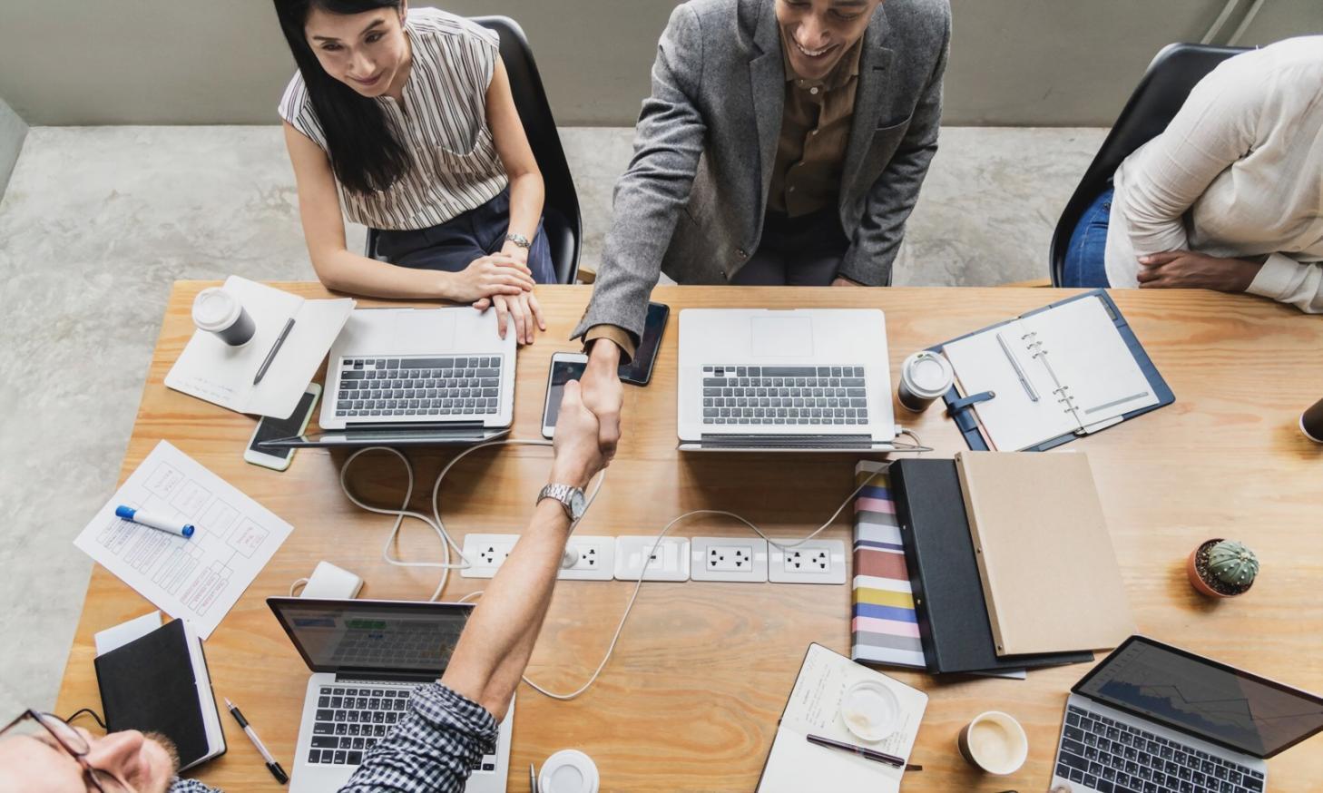 Financial goal tracking materials and planning resources laid out on desk